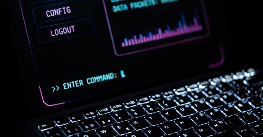 Close-up of a glowing laptop keypad with digital interface, representing futuristic technology.